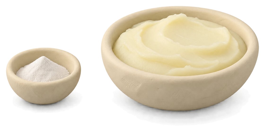 A very small clay bowl of white powder beside a large bowl of pale tallow